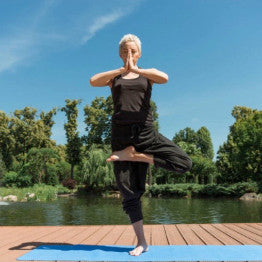 Woman balancing on one leg in a yoga pose