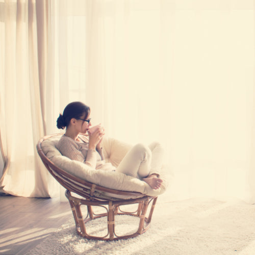 A woman relaxing in a chair