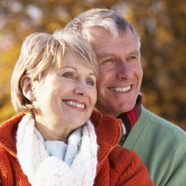 Older man  and woman smiling